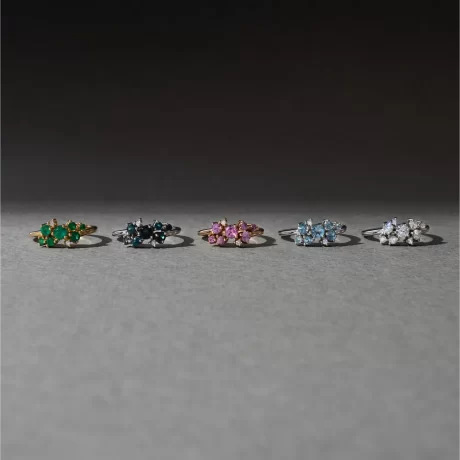 anéis ômega com gemas preciosas